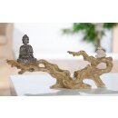 Buddha figure on tree trunk, about 35 cm